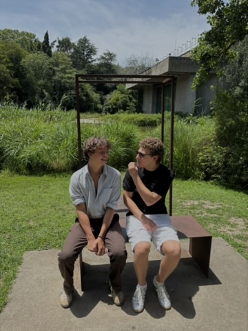 Students sitting in a park