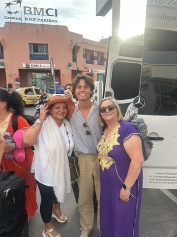 Students with locals during travel
